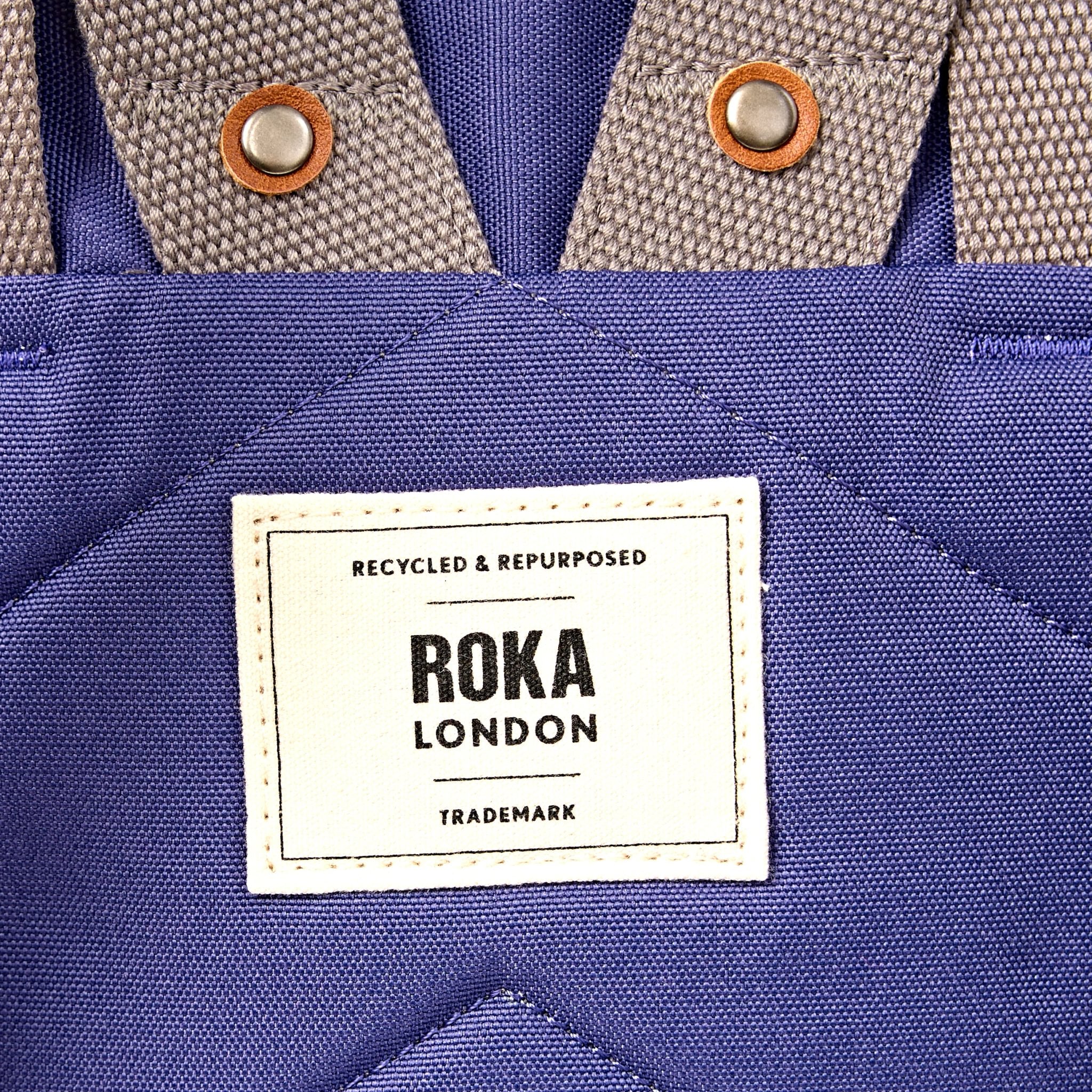 Roka Finchley Medium Oceana Recycled Canvas Backpack, brand label detail.
