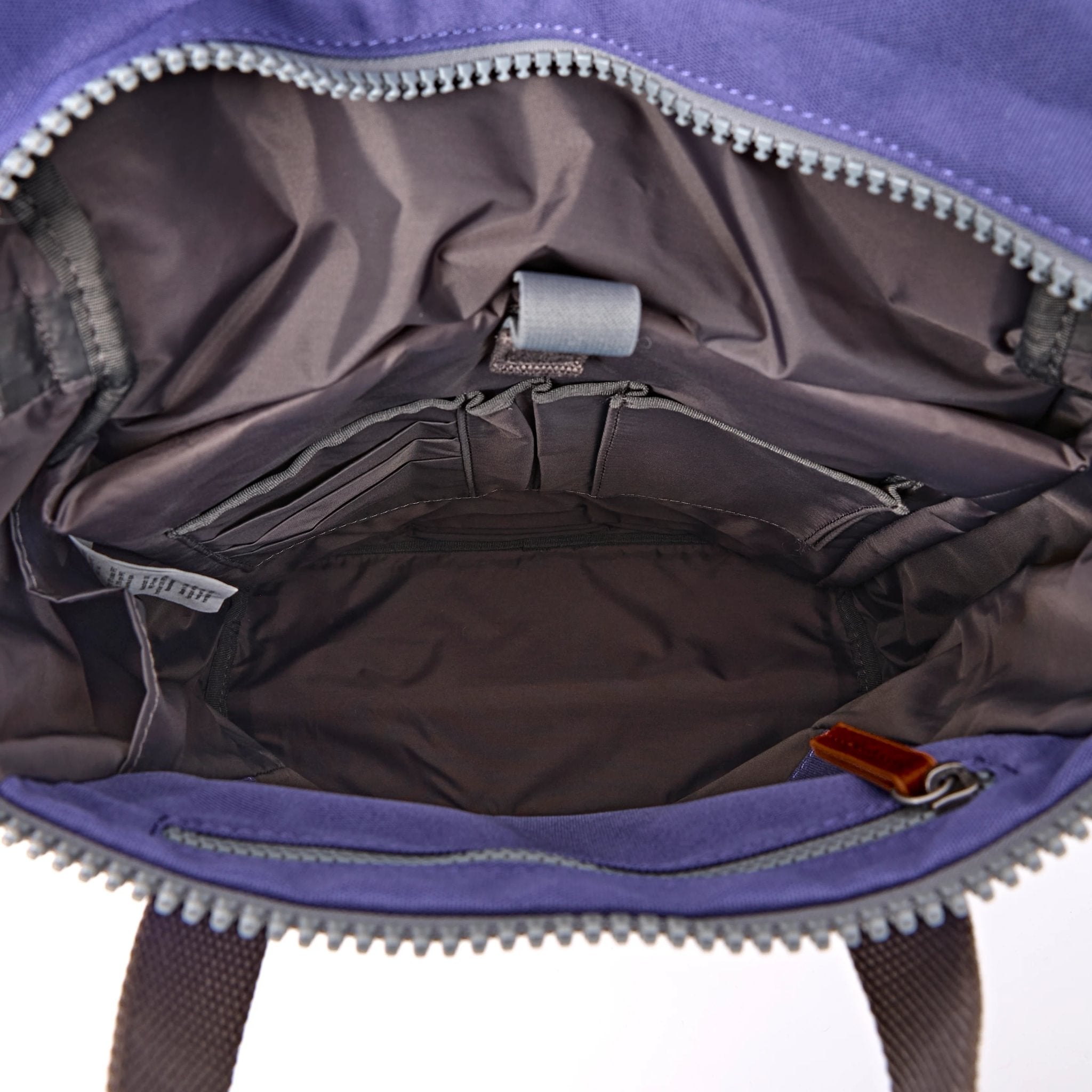 Roka Finchley Medium Oceana Recycled Canvas Backpack, side view.