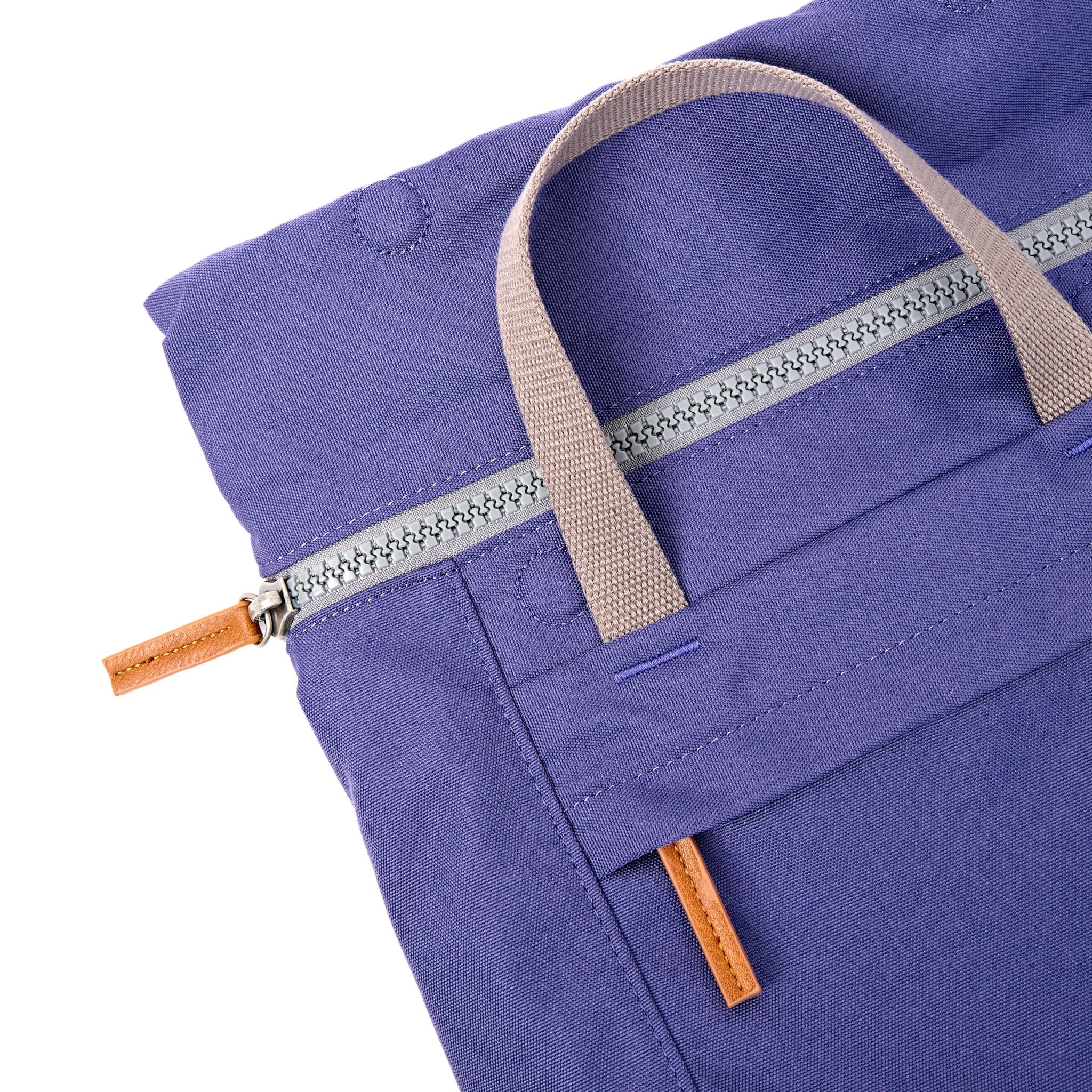 Roka Finchley Medium Oceana Recycled Canvas Backpack, zip detail.
