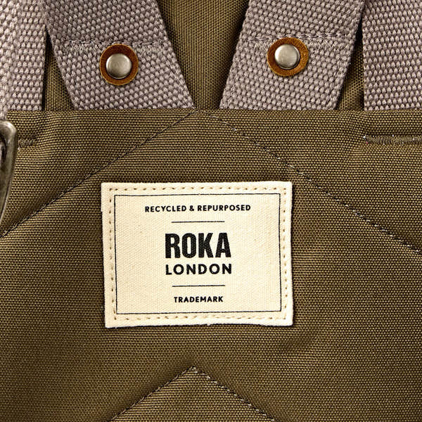 Roka Finchley Medium Sea Spray Recycled Canvas Backpack, brand label detail.