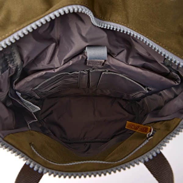 Roka Finchley Medium Sea Spray Recycled Canvas Backpack, side view.
