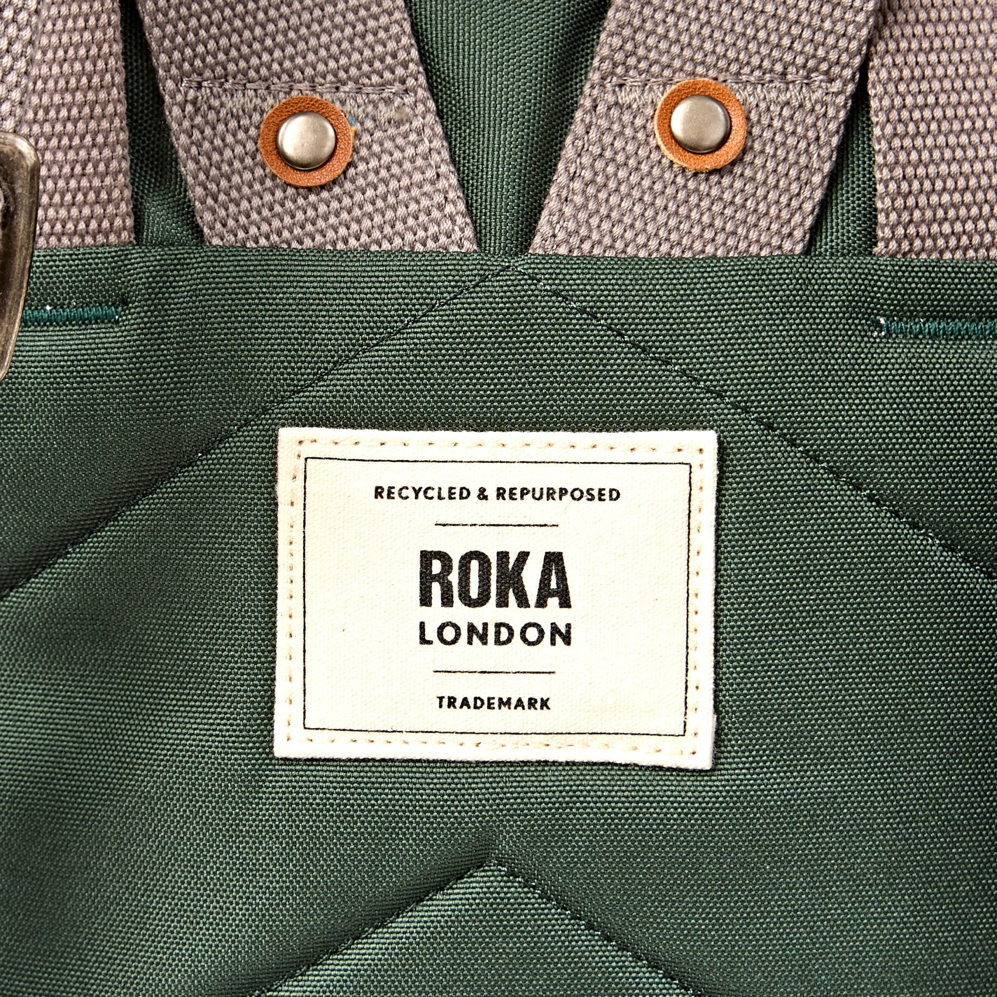 Roka Finchley Medium Thunderstorm Recycled Canvas Backpack, brand label detail.