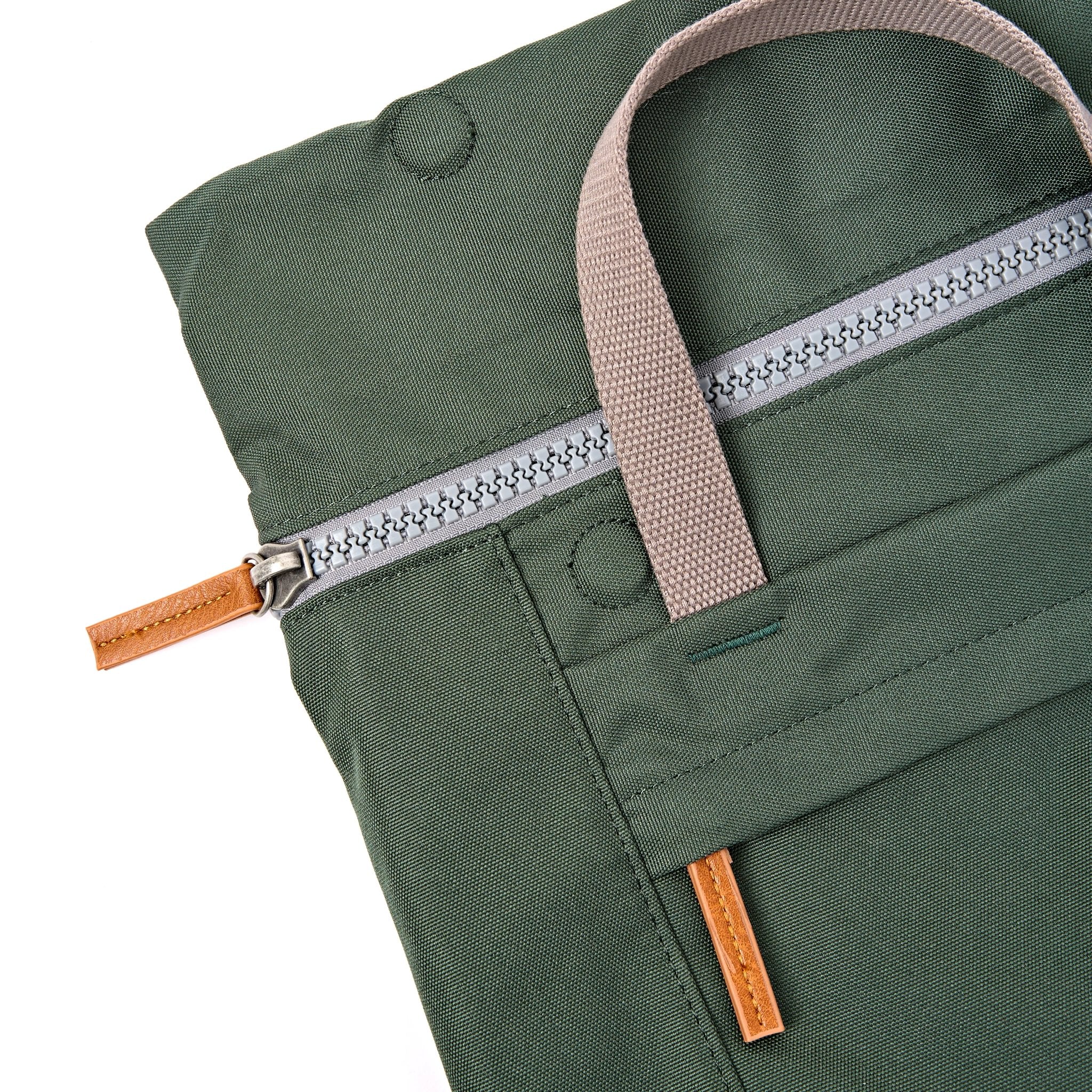 Roka Finchley Medium Thunderstorm Recycled Canvas Backpack, zip detail.