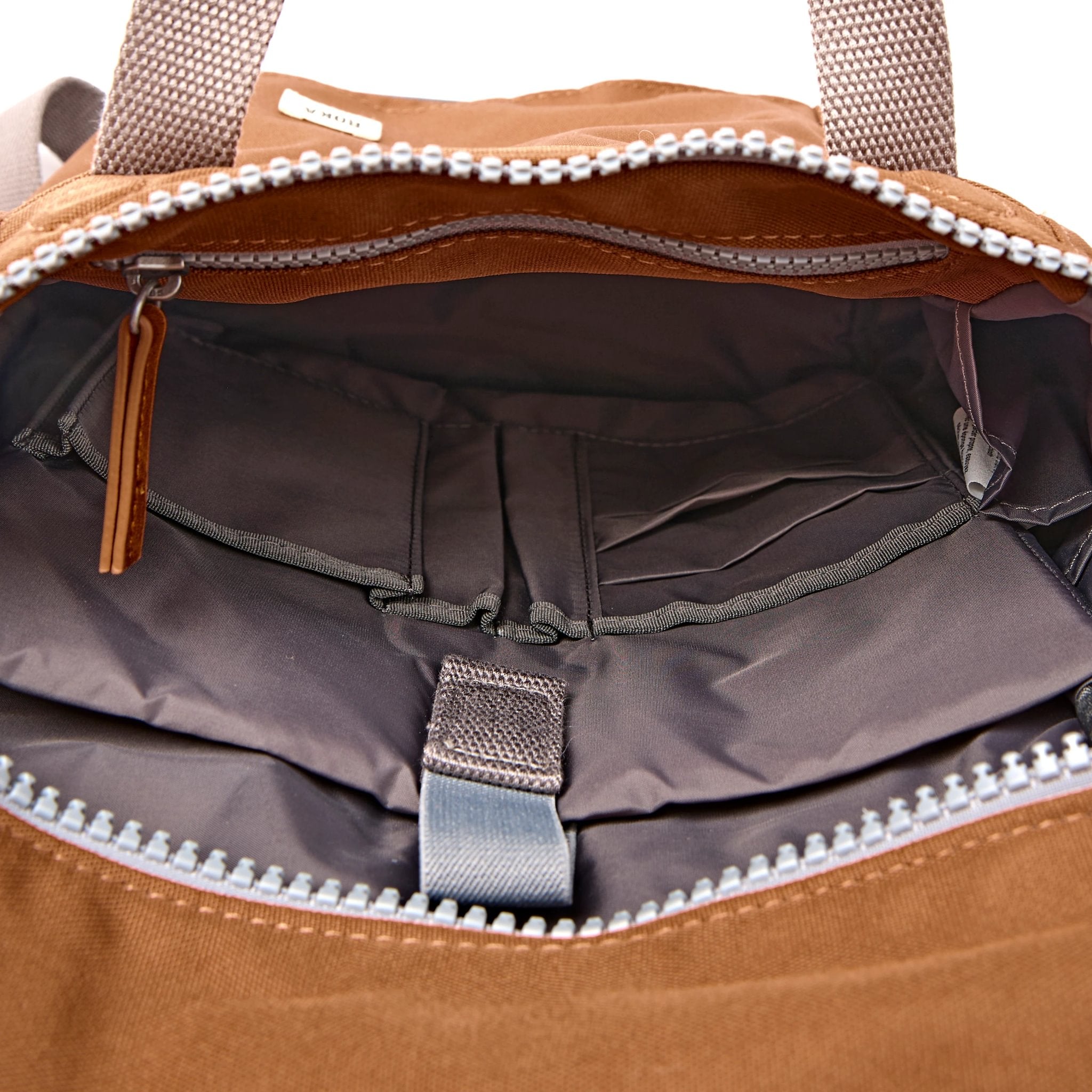 Roka Finchley Small Cinnamon Recycled Canvas Backpack, side view.