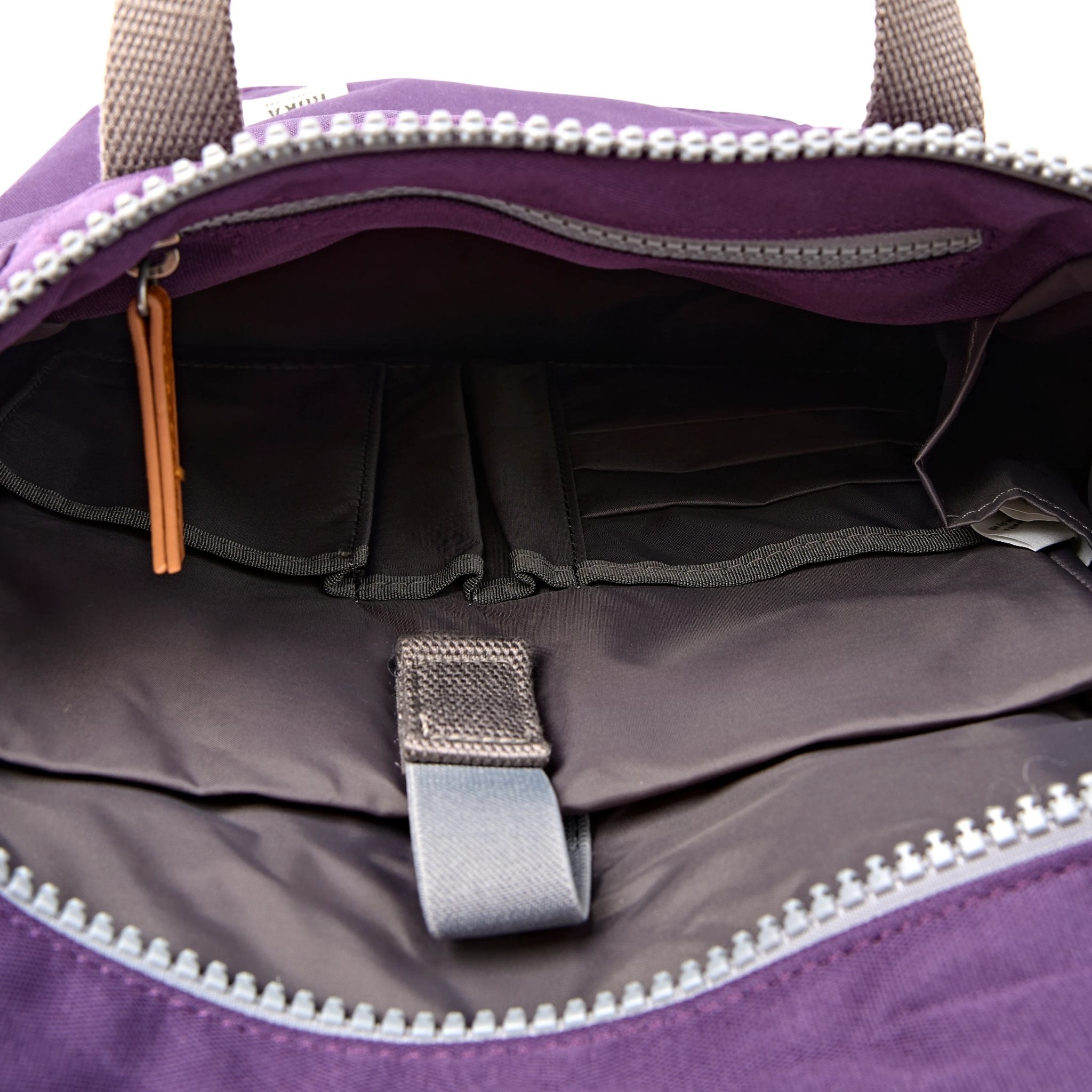 Roka Finchley Small Deep Grape Recycled Canvas Backpack, side view.