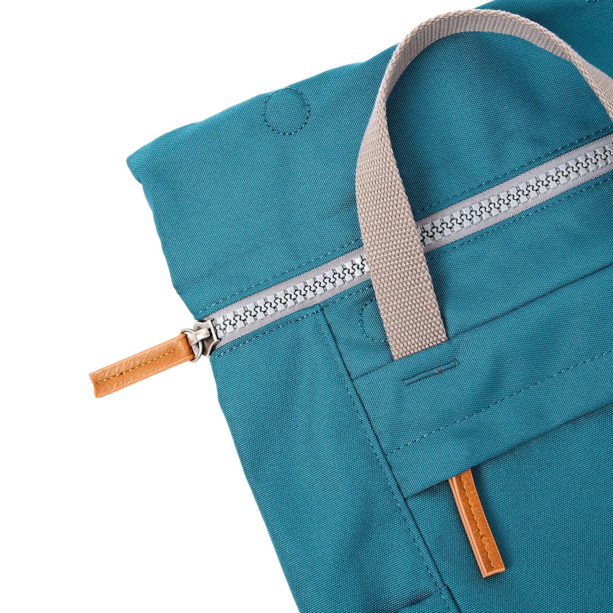 Roka Finchley Small Deep Teal Recycled Canvas Backpack, zip detail.