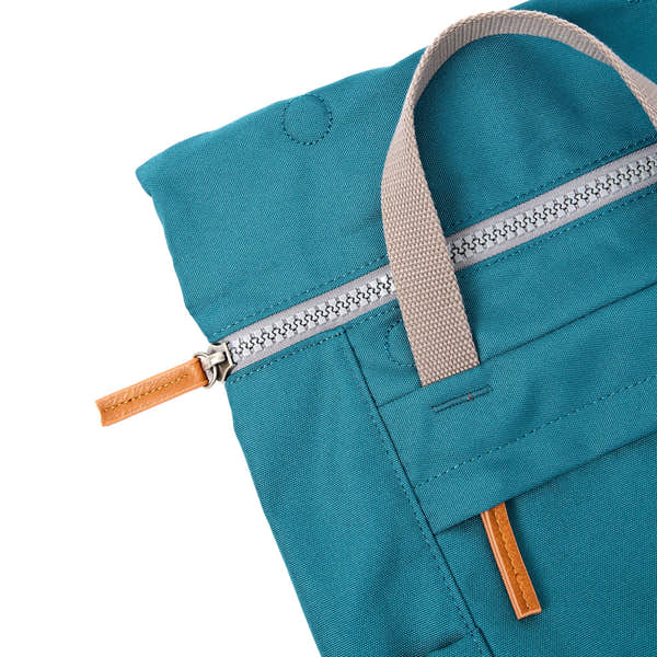 Roka Finchley Small Deep Teal Recycled Canvas Backpack, zip detail.