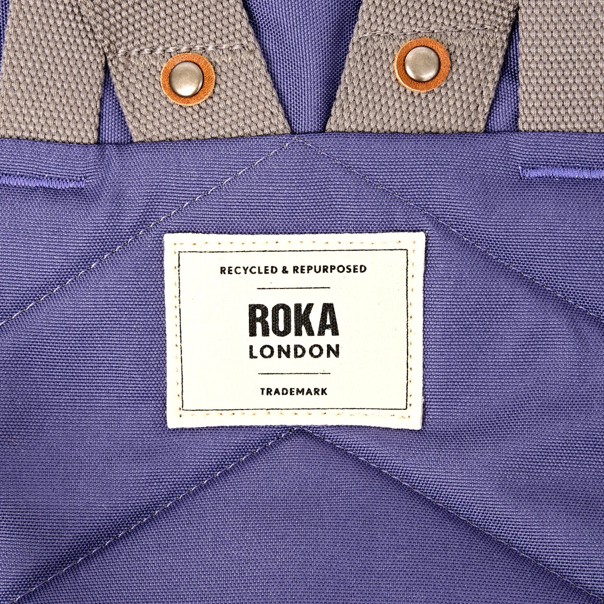 Roka Finchley Small Oceana Recycled Canvas Backpack, brand label detail.
