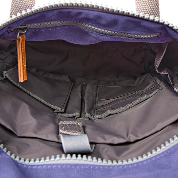 Roka Finchley Small Oceana Recycled Canvas Backpack, side view.