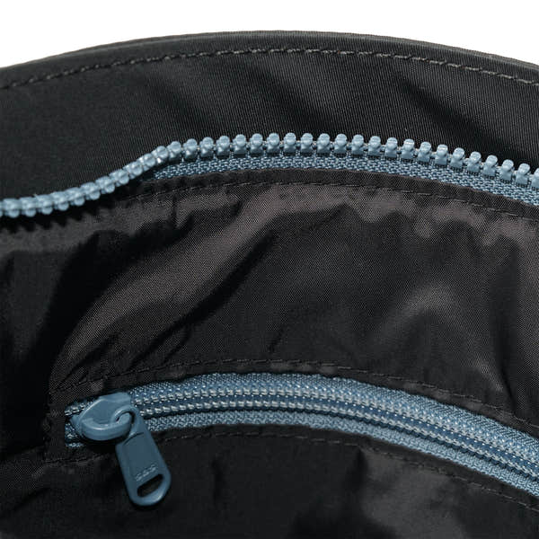 Roka Kennington B Crossbody Recycled Nylon Airforce, side view.