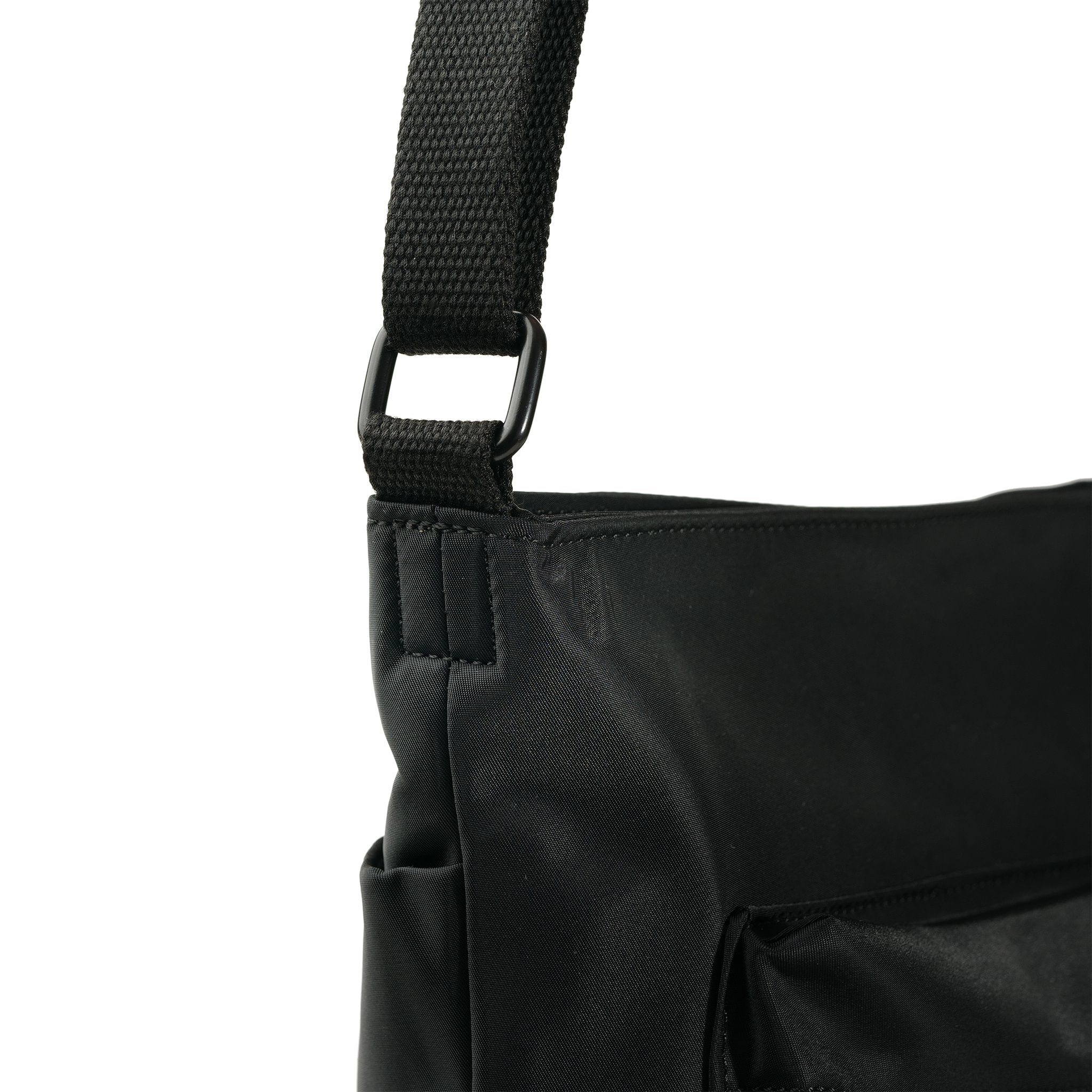 Roka Kennington B Crossbody Recycled Nylon Airforce, strap detail.