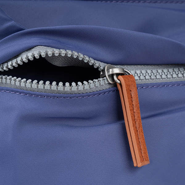 Roka Kennington B Crossbody Recycled Nylon Indigo, zip detail.