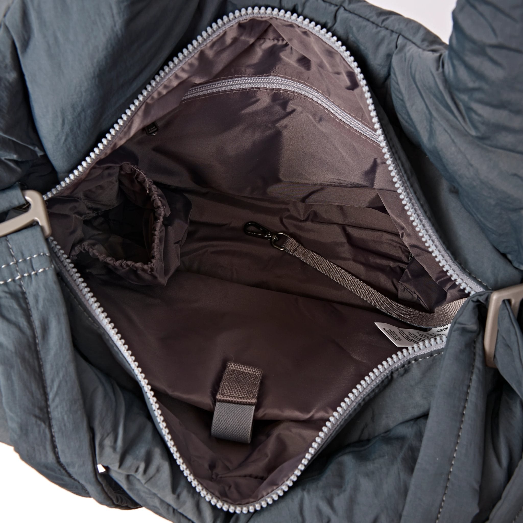 Roka Oxford Raven Recycled Taslon Shoulder Bag, side view.