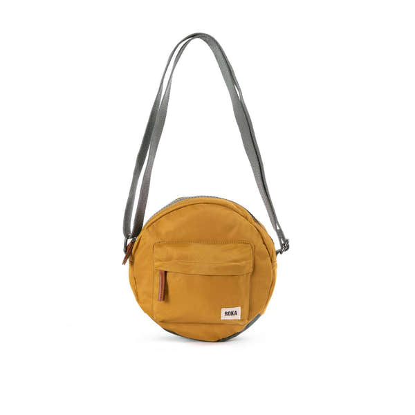 Roka Paddington Corn Recycled Nylon Crossbody Bag, front view.
