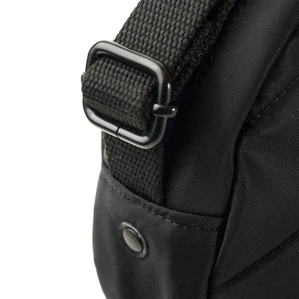 Roka Paddington Corn Recycled Nylon Crossbody Bag, strap detail.