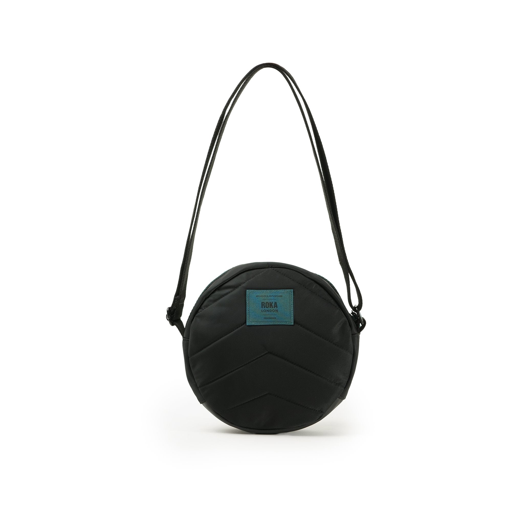 Roka Paddington Teal Recycled Nylon Crossbody Bag, back view.
