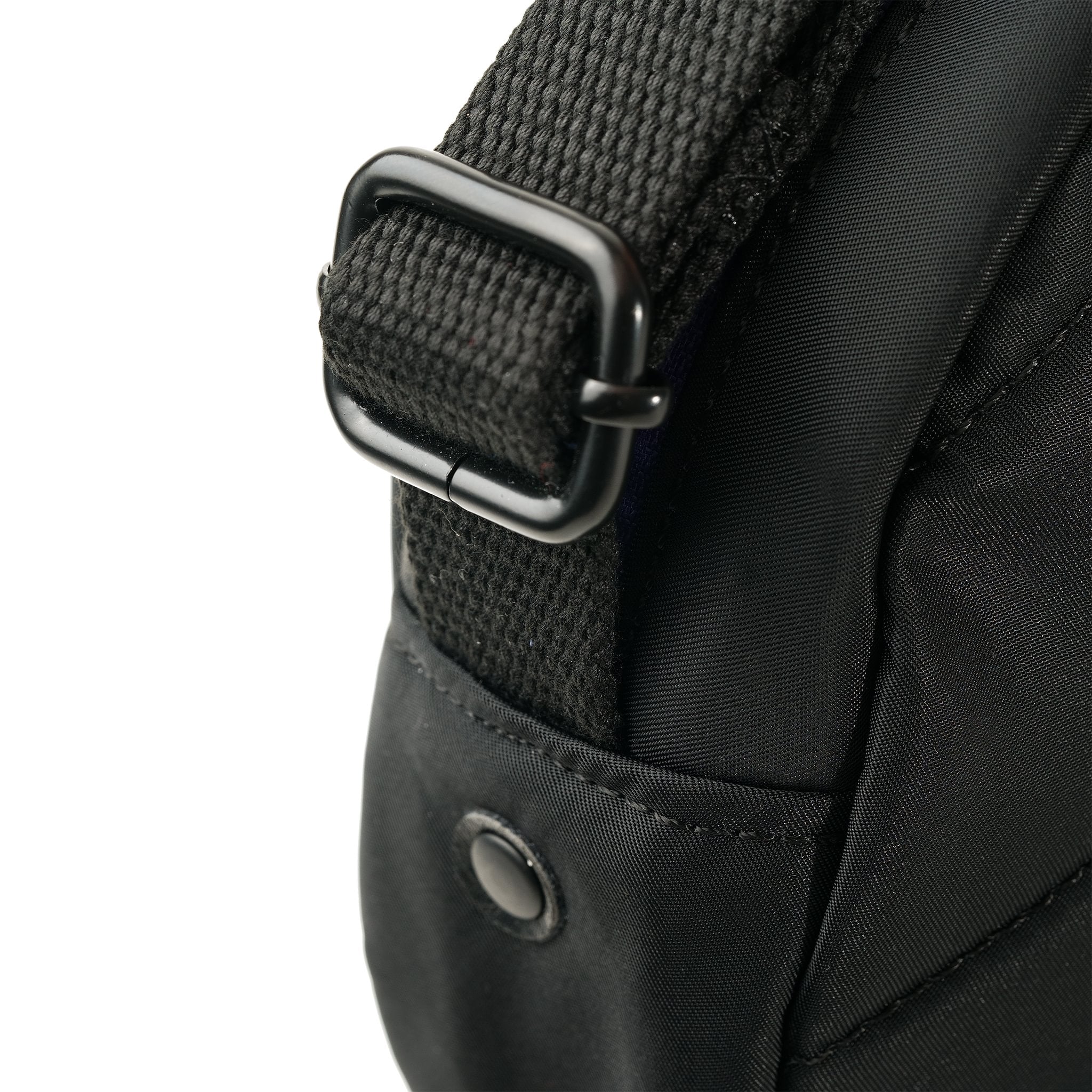 Roka Paddington Teal Recycled Nylon Crossbody Bag, strap detail.
