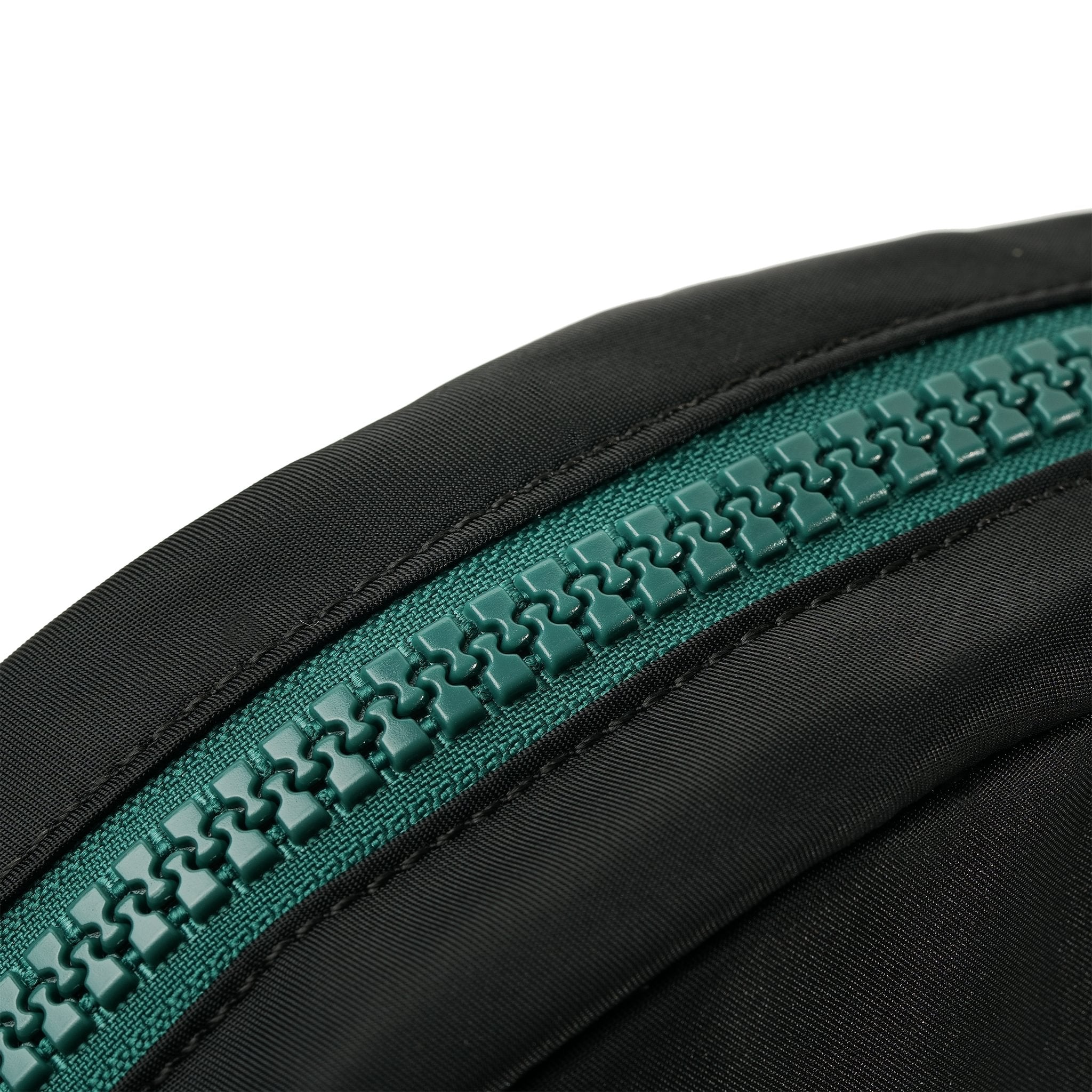 Roka Paddington Teal Recycled Nylon Crossbody Bag, zip detail.