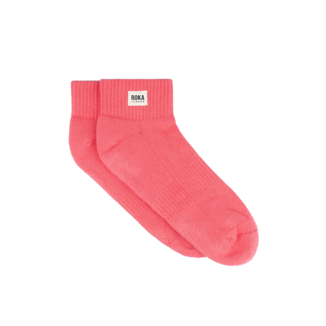 Roka Wembley Cotton Socks Coral, flat lay view.