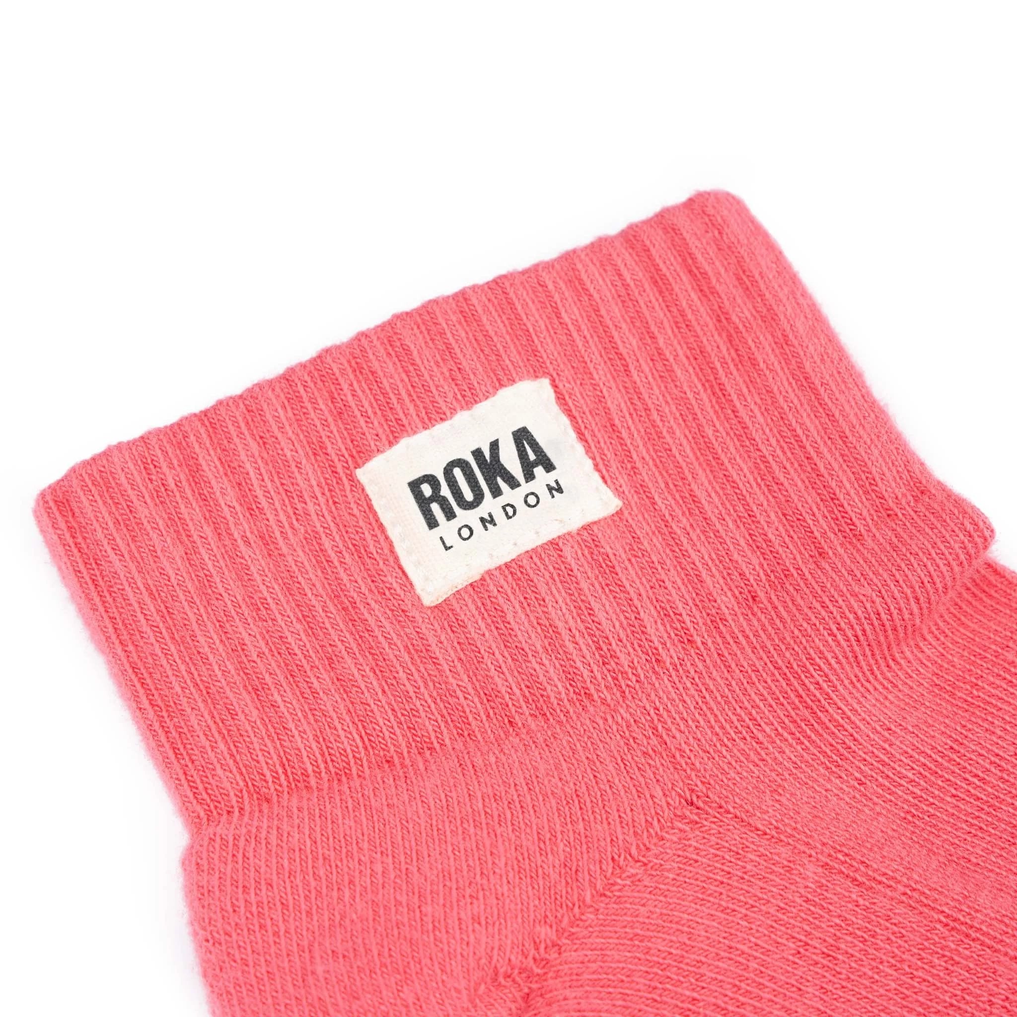 Roka Wembley Cotton Socks Coral, brand label detail.