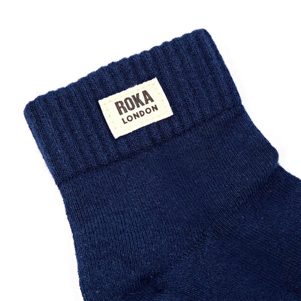 Roka Wembley Ladies Deep Blue Organic Cotton Ankle Socks, brand label detail.