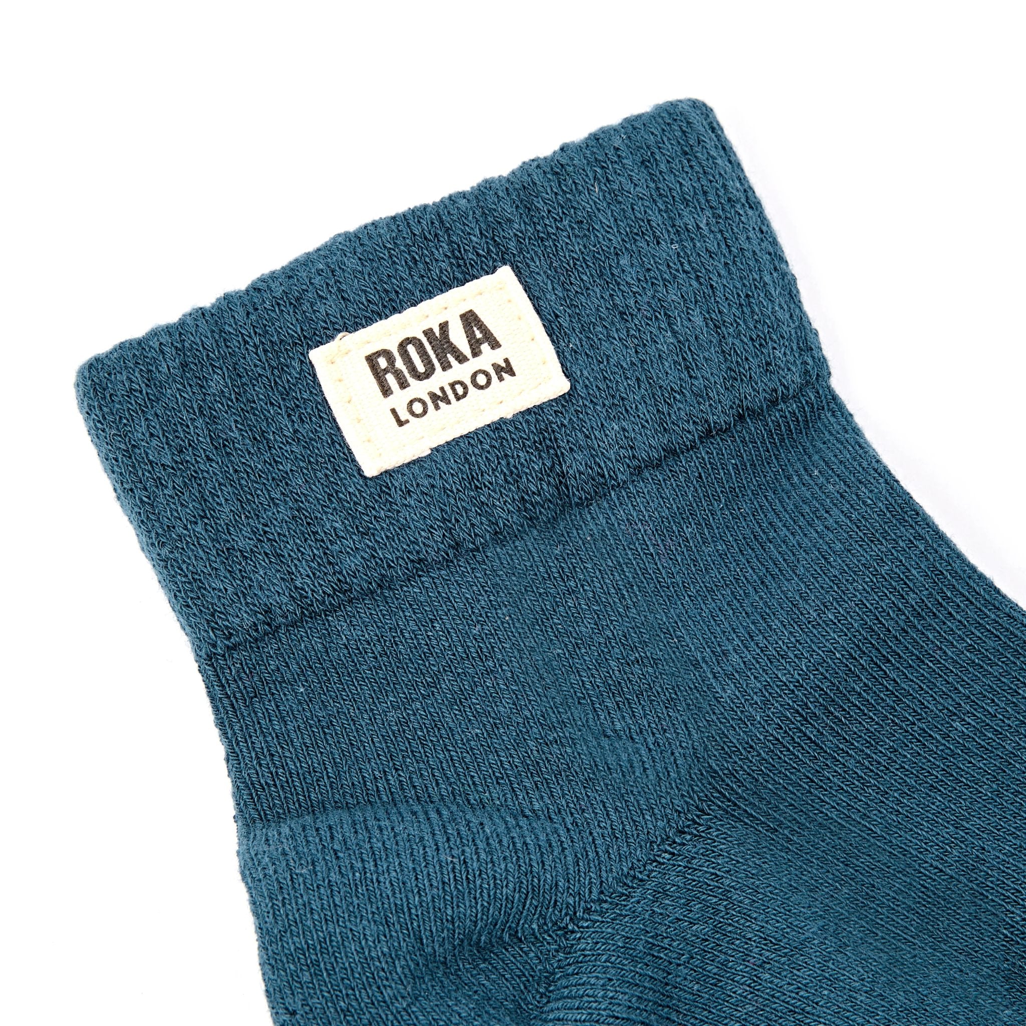 Roka Wembley Ladies Lagoon Blue Organic Cotton Ankle Socks, brand label detail.