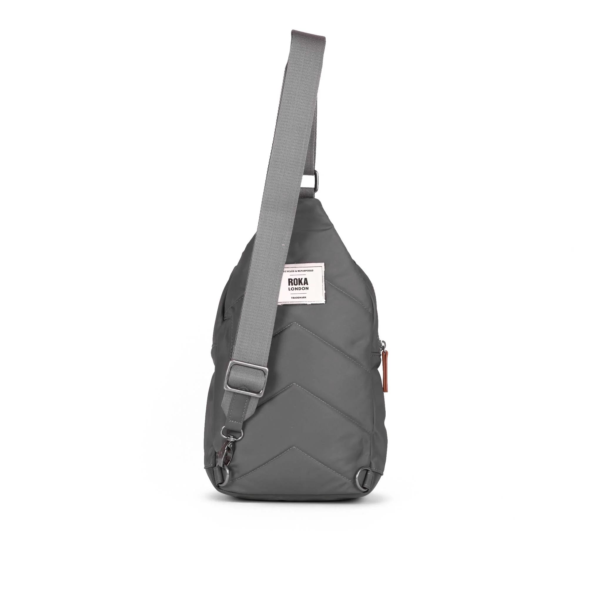 Roka Willesden Graphite Recycled Nylon Sling Bag, back view.