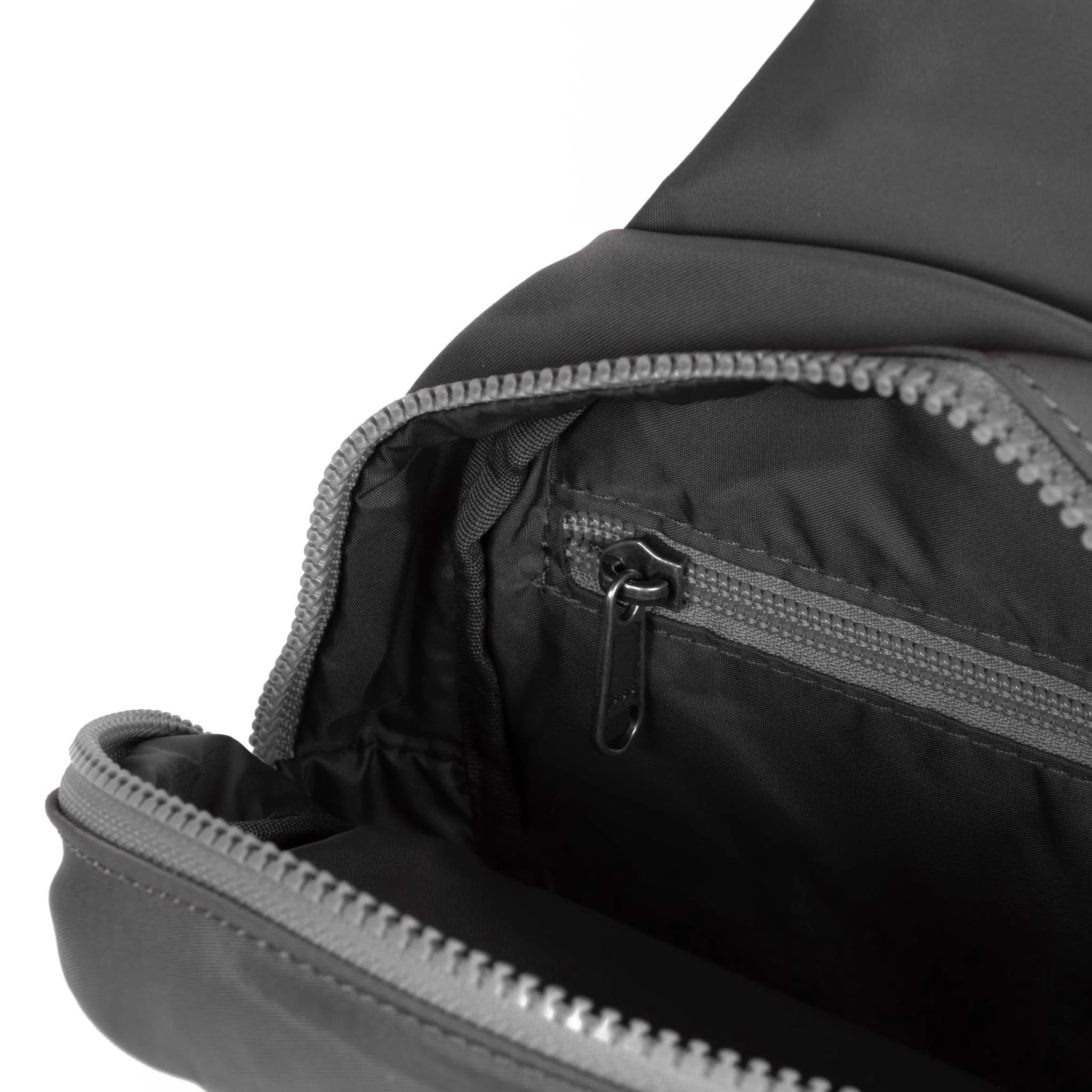 Roka Willesden Graphite Recycled Nylon Sling Bag, side view.