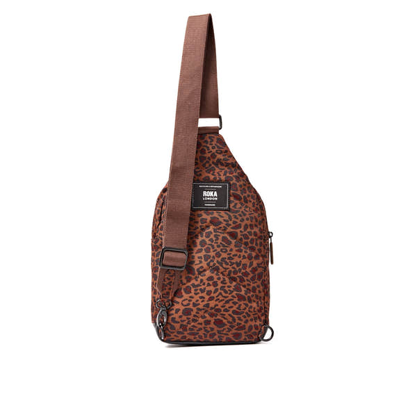 Roka Willesden Mini Leopard Recycled Canvas Sling Bag, back view.