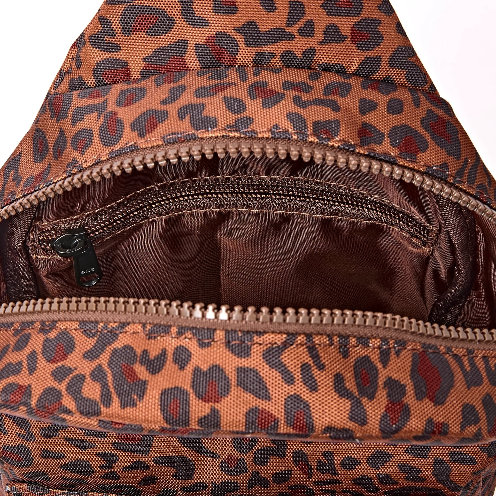 Roka Willesden Mini Leopard Recycled Canvas Sling Bag, first interior view.