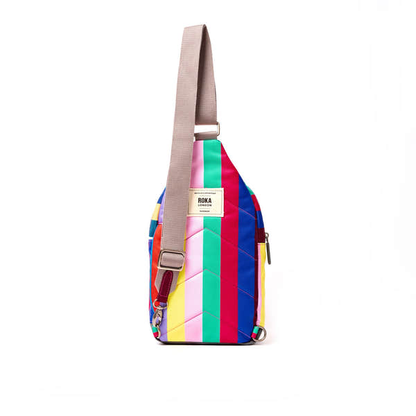 Roka Willesden Wide Multi Stripe Recycled Canvas Sling Bag, back view.