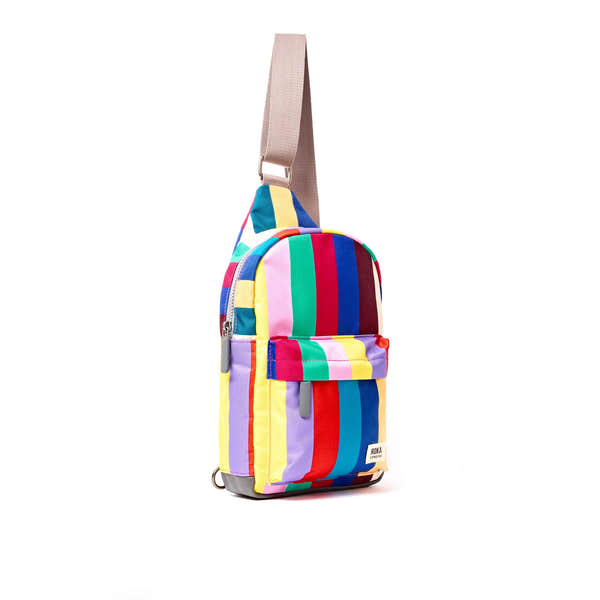 Roka Willesden Wide Multi Stripe Recycled Canvas Sling Bag, side view.