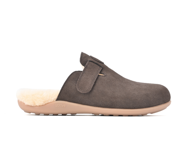 Strive Oslo II chocolate brown slipper, side profile showing the instep strap and open heel