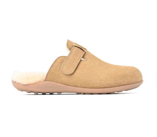 Strive Oslo II iced coffee tan slipper, side profile showing the instep strap and open heel