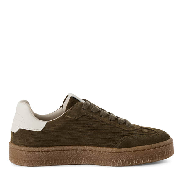 Inner side of the olive Tamaris lace-up trainer showing the lace fastening and layered sole.