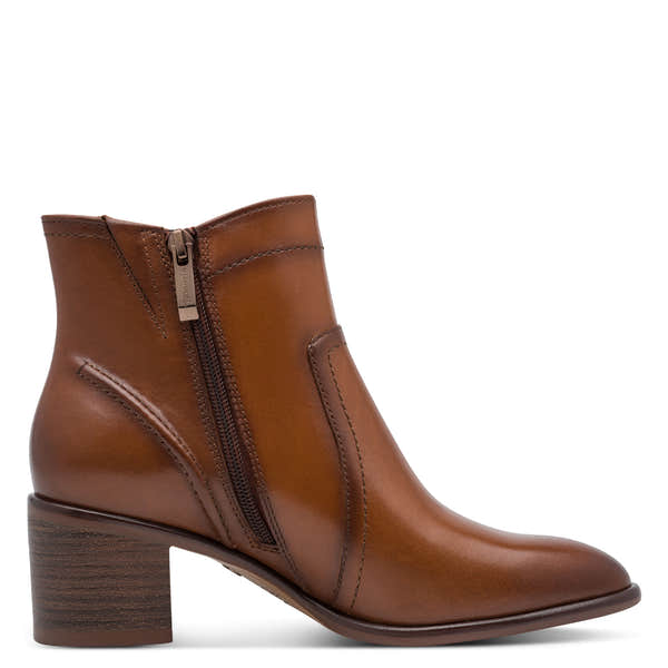 Inner side of the cognac Tamaris ankle boot showing the side zip and block heel.