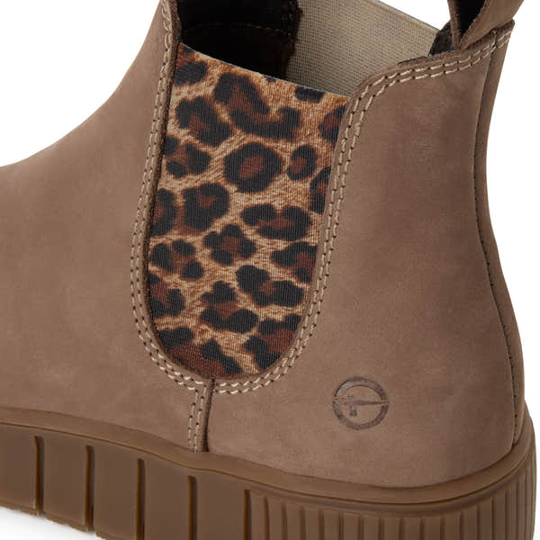 Close-up of the taupe leopard Tamaris Chelsea boot showing the leopard detail, stitching and elastic side panel.