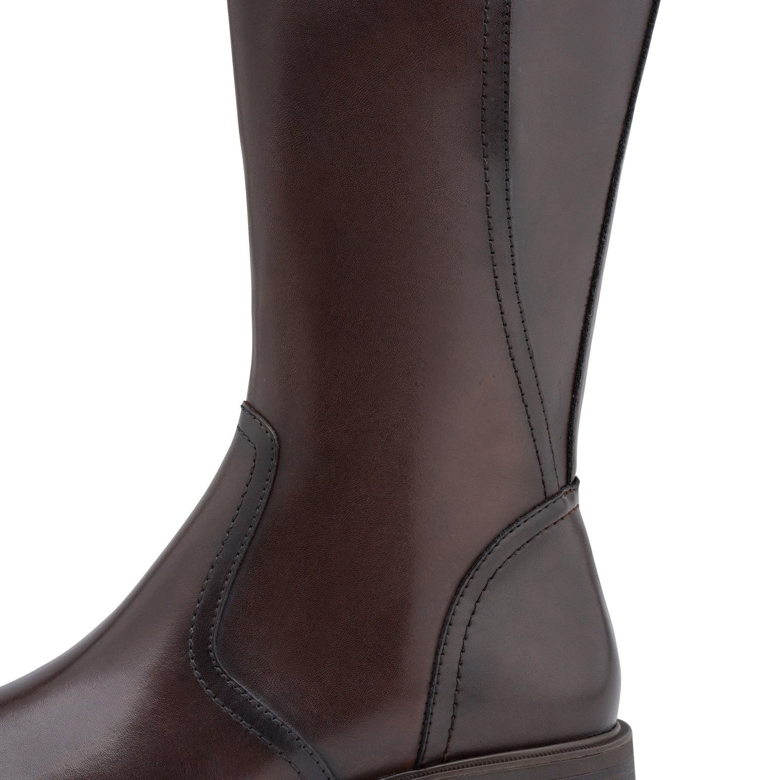 Close-up of the mahogany brown Tamaris knee-high boot showing the mixed leather panels, stitching and heel.