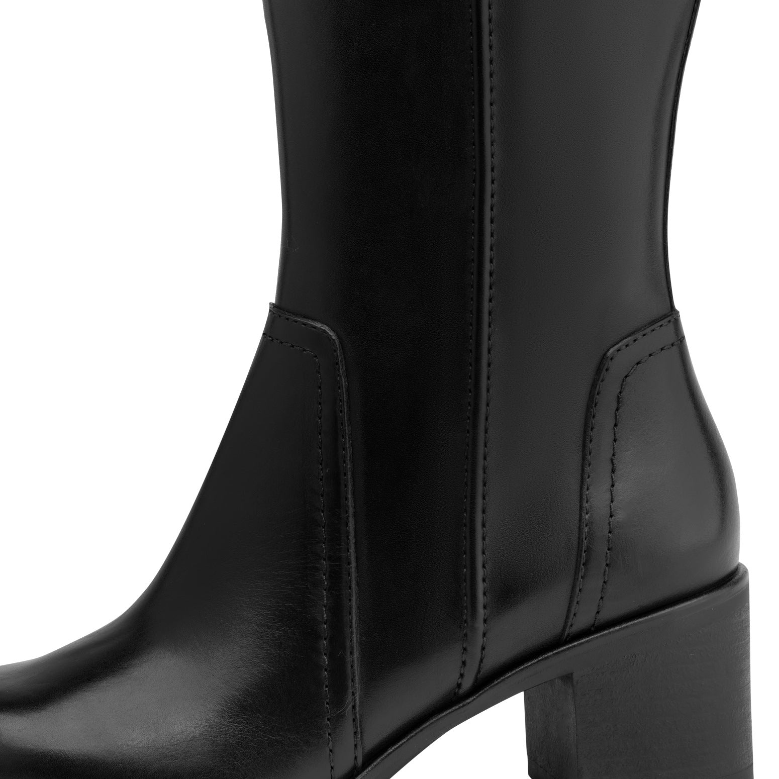 Close-up of the black Tamaris knee-high boot showing the leather panels, stitching and block heel.