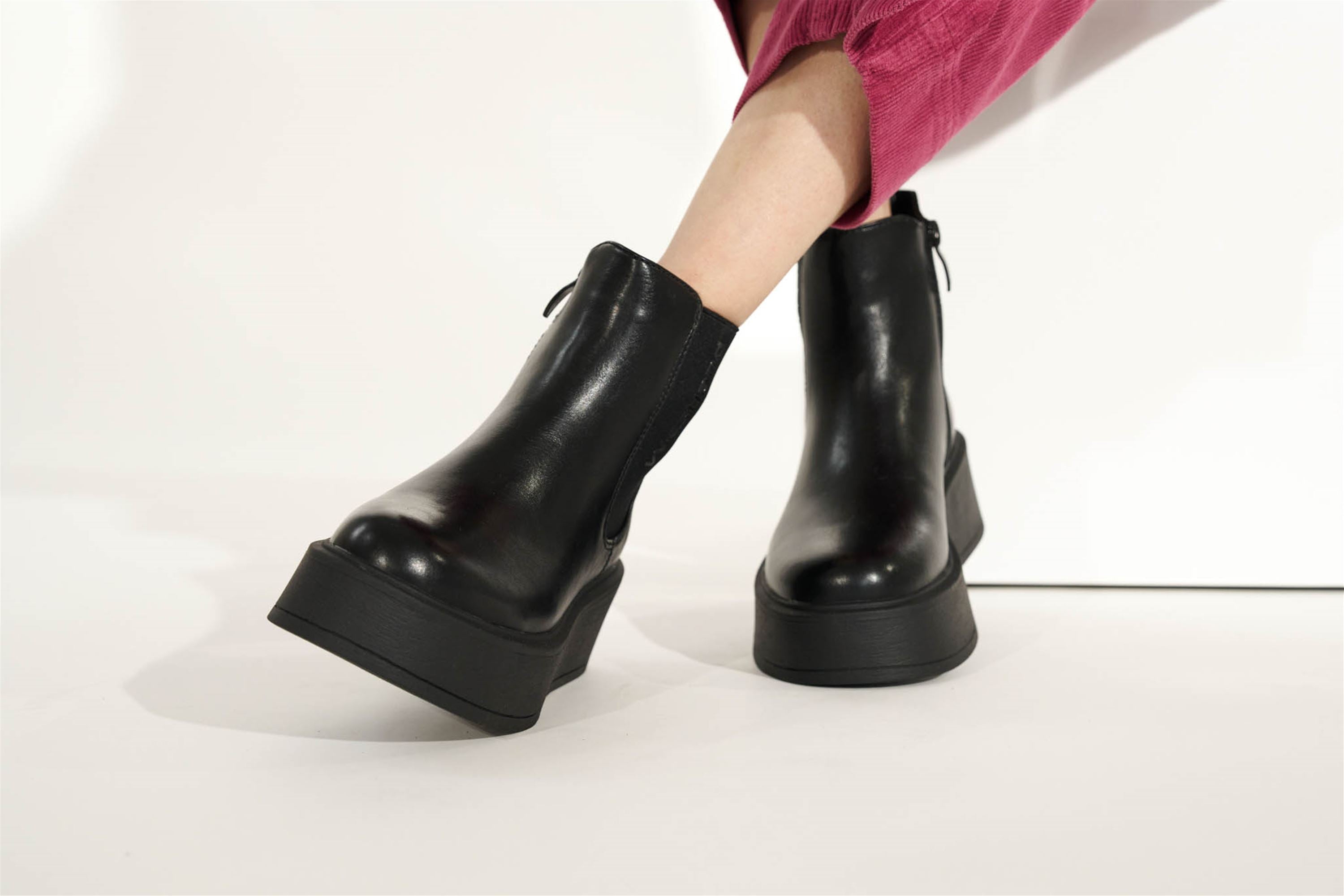 Westland Gemma 01 women's black vegan platform chelsea ankle boots worn on foot, Westland lifestyle view 1.
