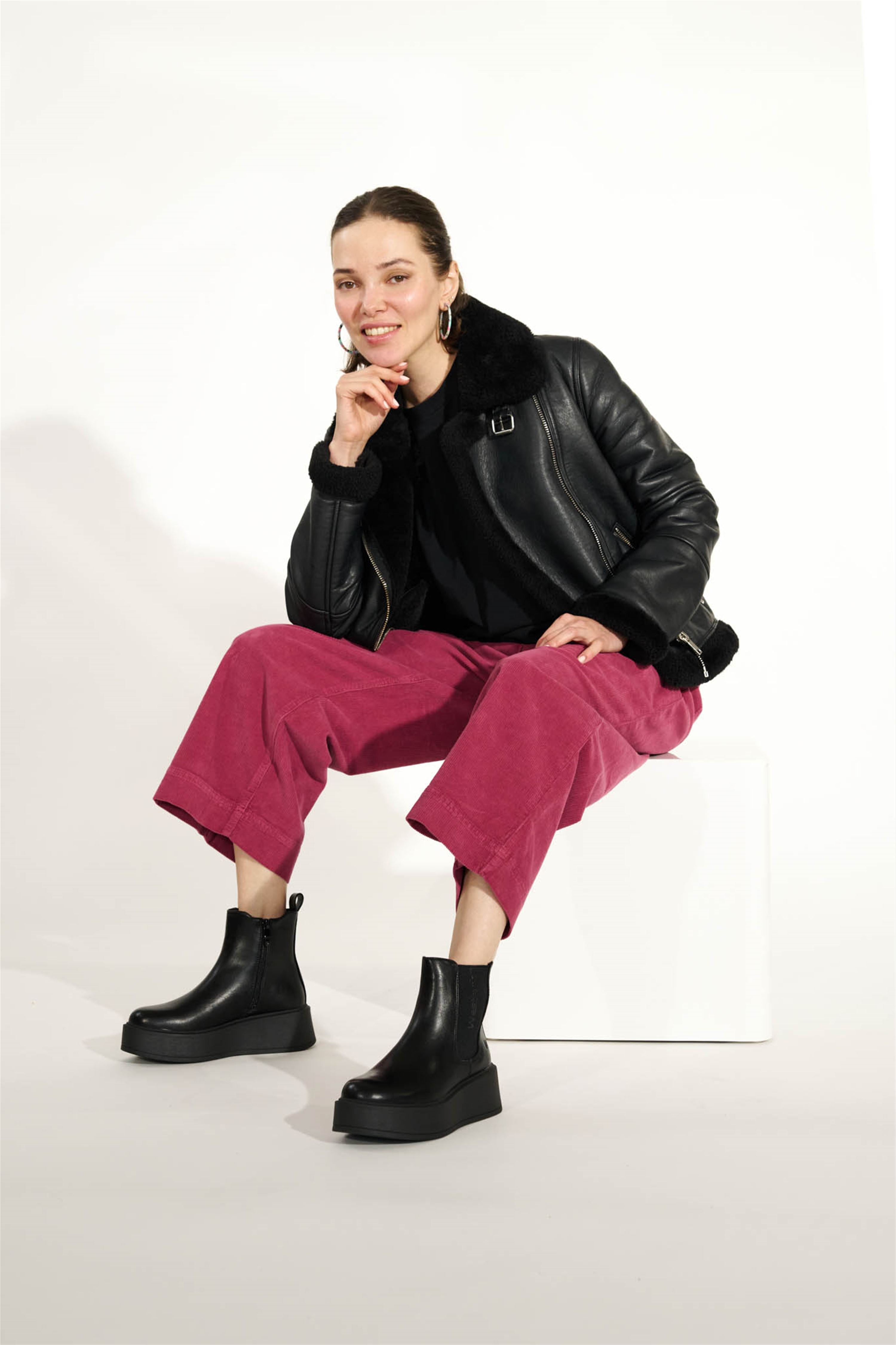 Westland Gemma 01 women's black vegan platform chelsea ankle boots worn on foot, Westland lifestyle view 2.