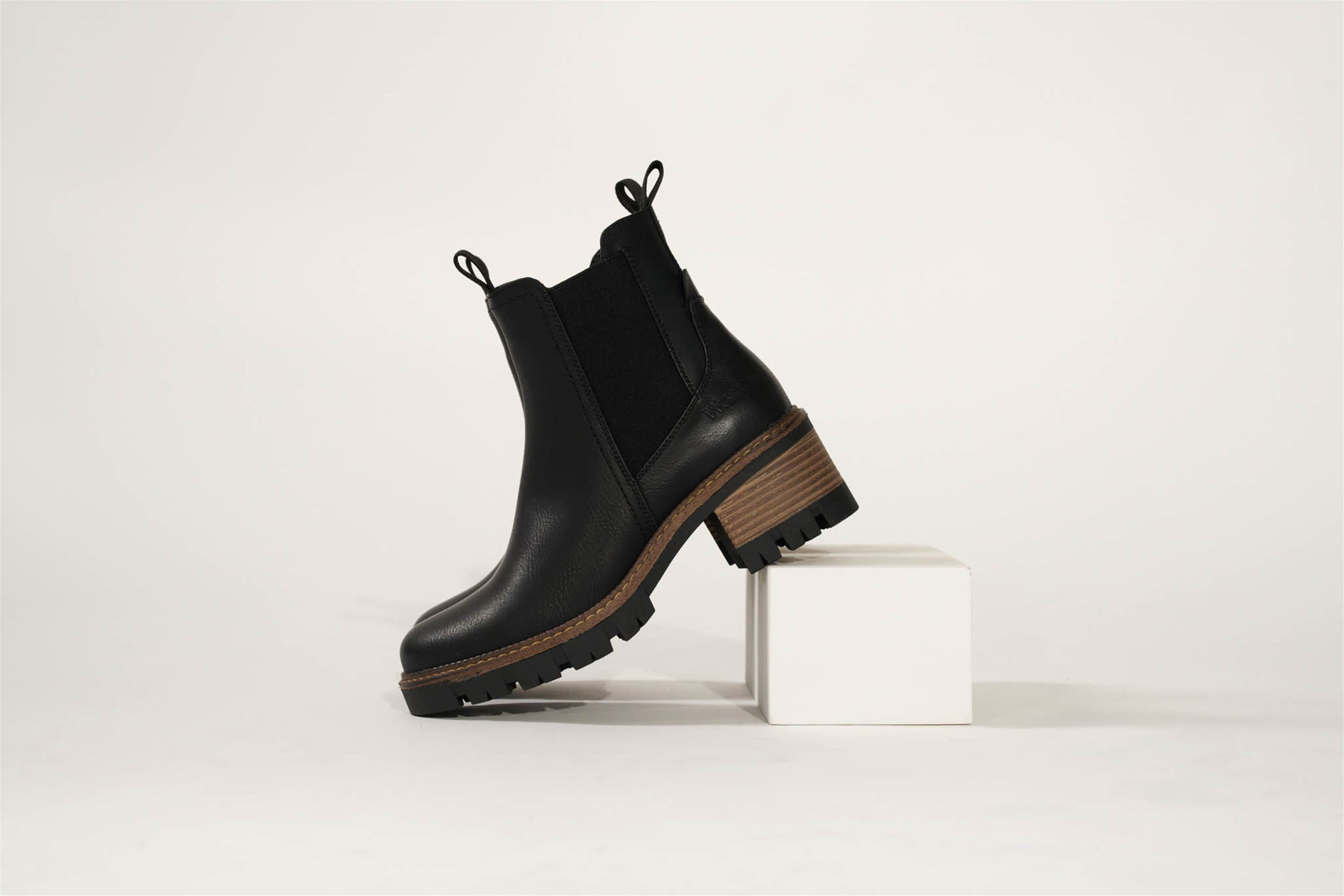 Westland Geri 03 women's black vegan heeled chelsea ankle boots worn on foot, Westland lifestyle view 14.
