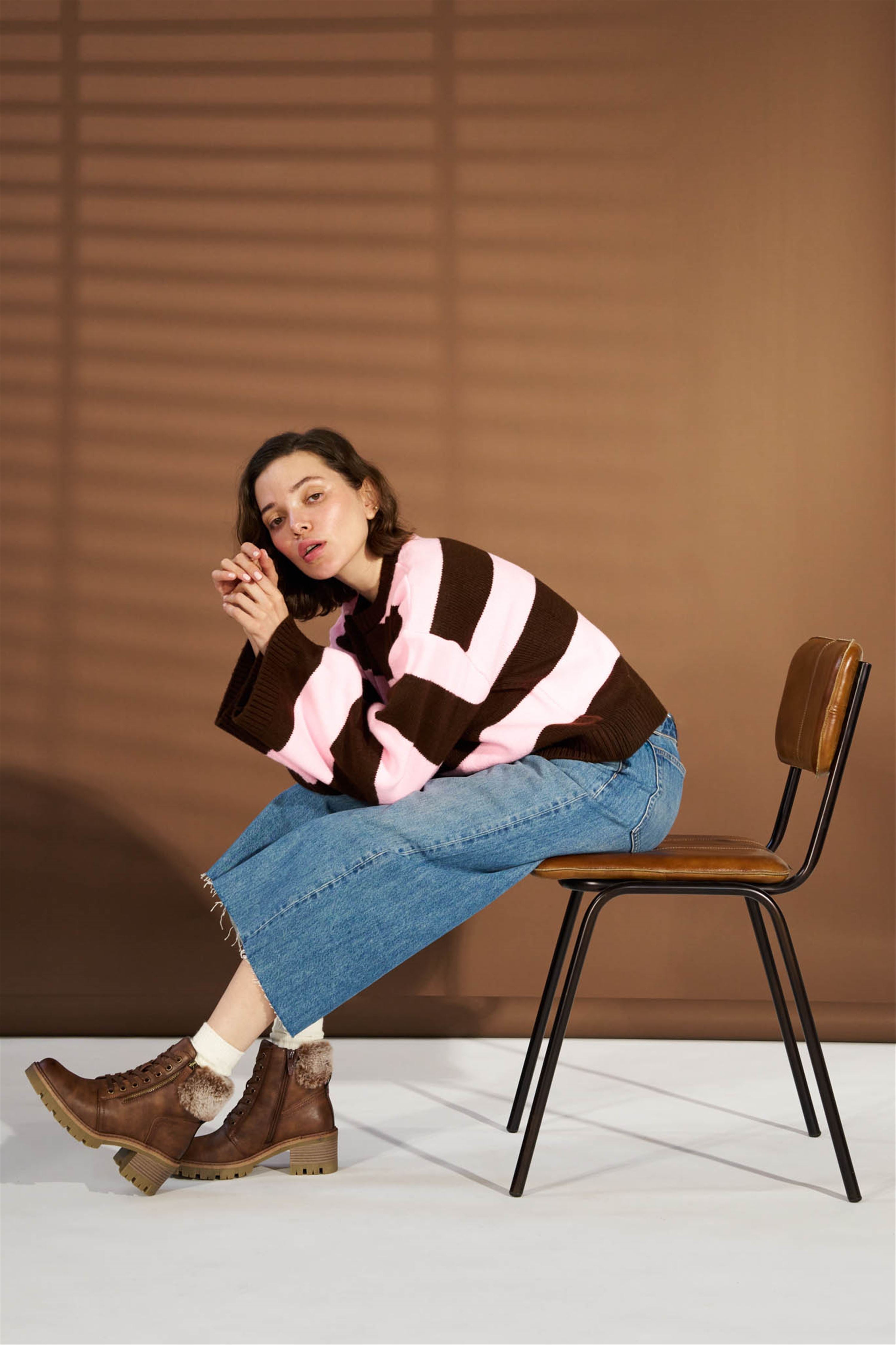 Westland Geri 04 women's brown vegan faux fur zip-and-lace heeled ankle boots worn on foot, Westland lifestyle view 4.