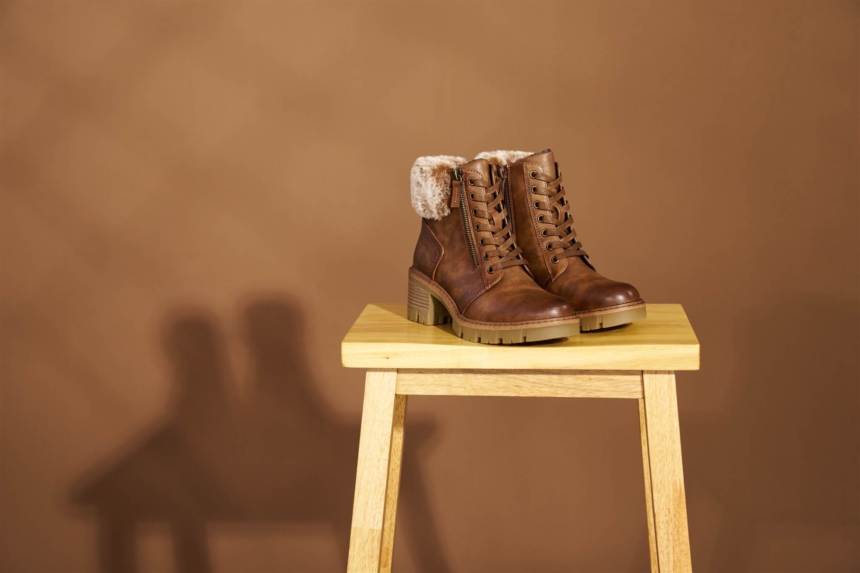 Westland Geri 04 women's brown vegan faux fur zip-and-lace heeled ankle boots worn on foot, Westland lifestyle view 6.