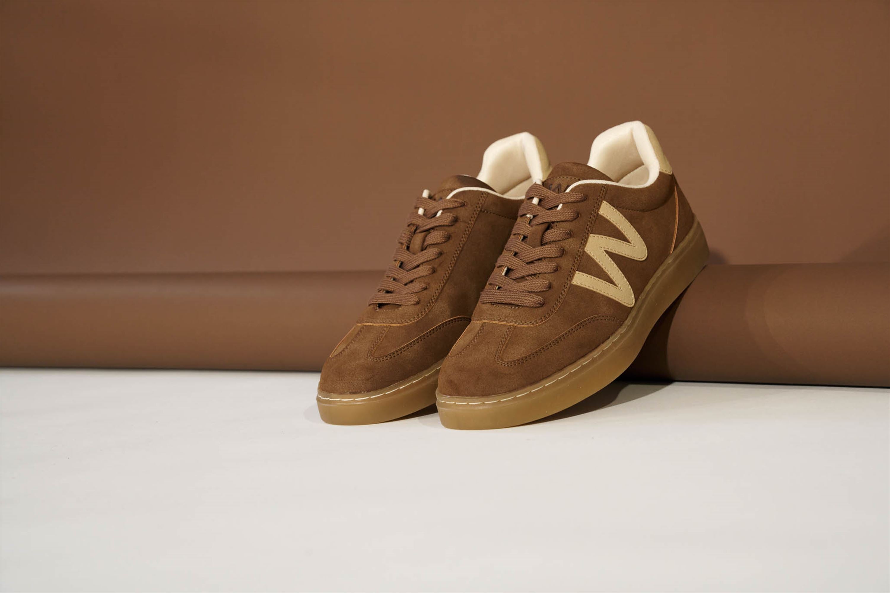 Westland Kira 01 women's brown combi vegan lace-up trainers worn on foot, Westland lifestyle view 1.