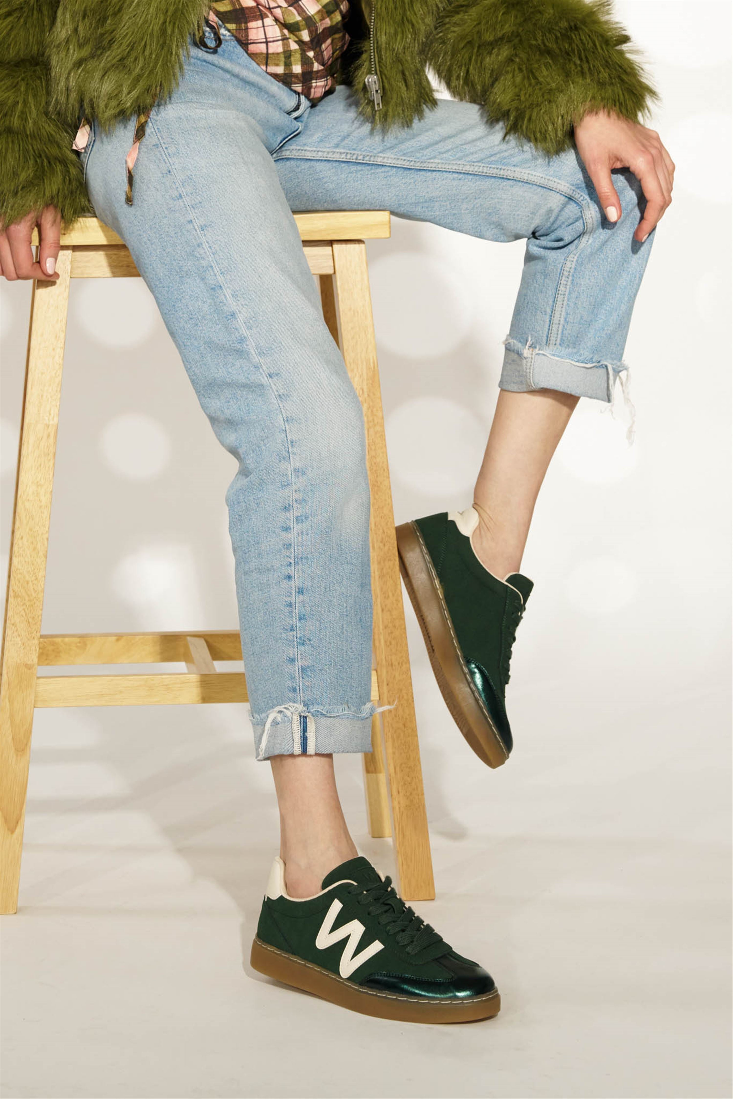 Westland Kira 01 women's green combi vegan lace-up trainers worn on foot, Westland lifestyle view 1.
