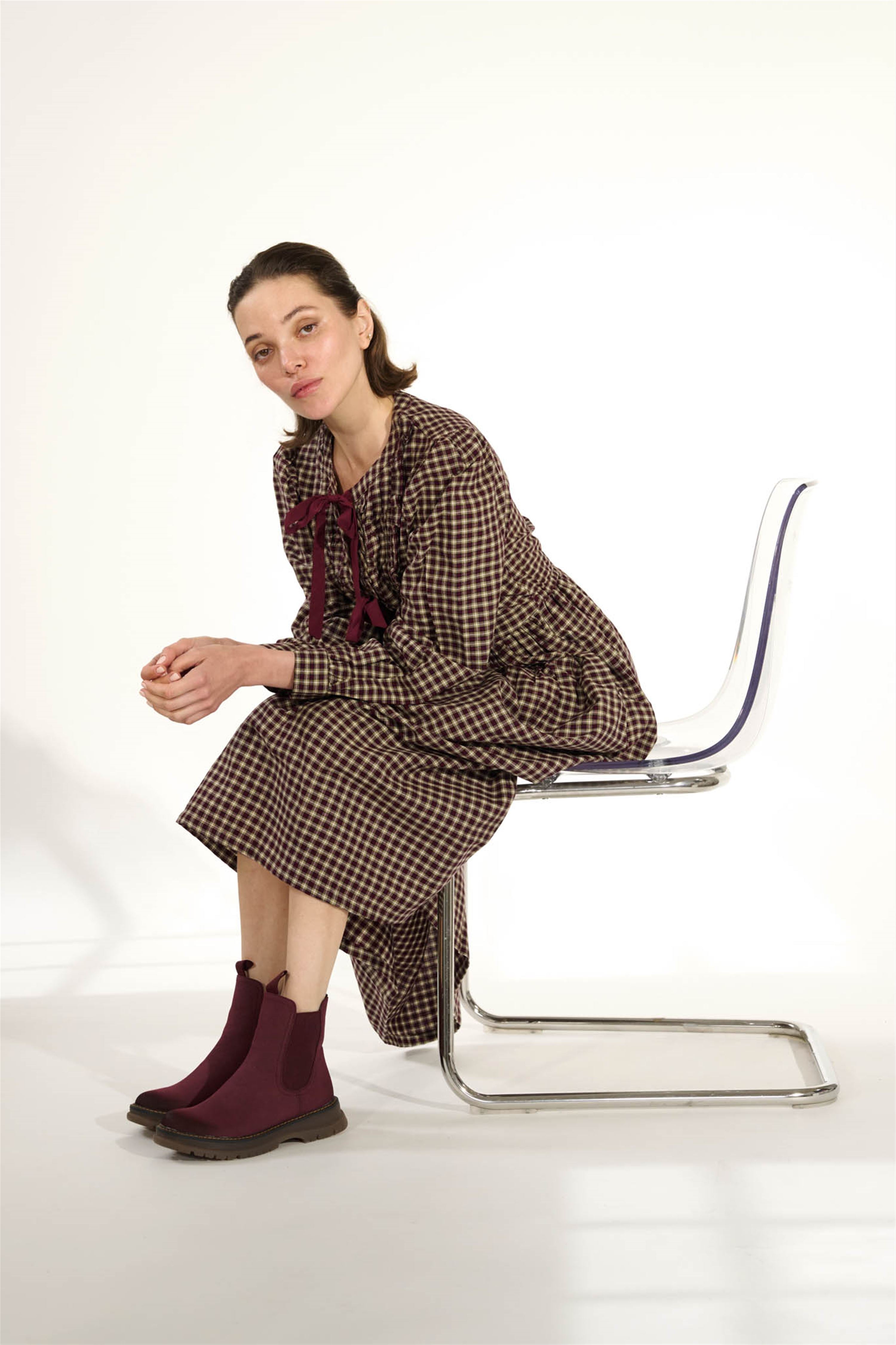 Westland Peyton 05 women's burgundy vegan chelsea ankle boots worn on foot, Westland lifestyle view 5.