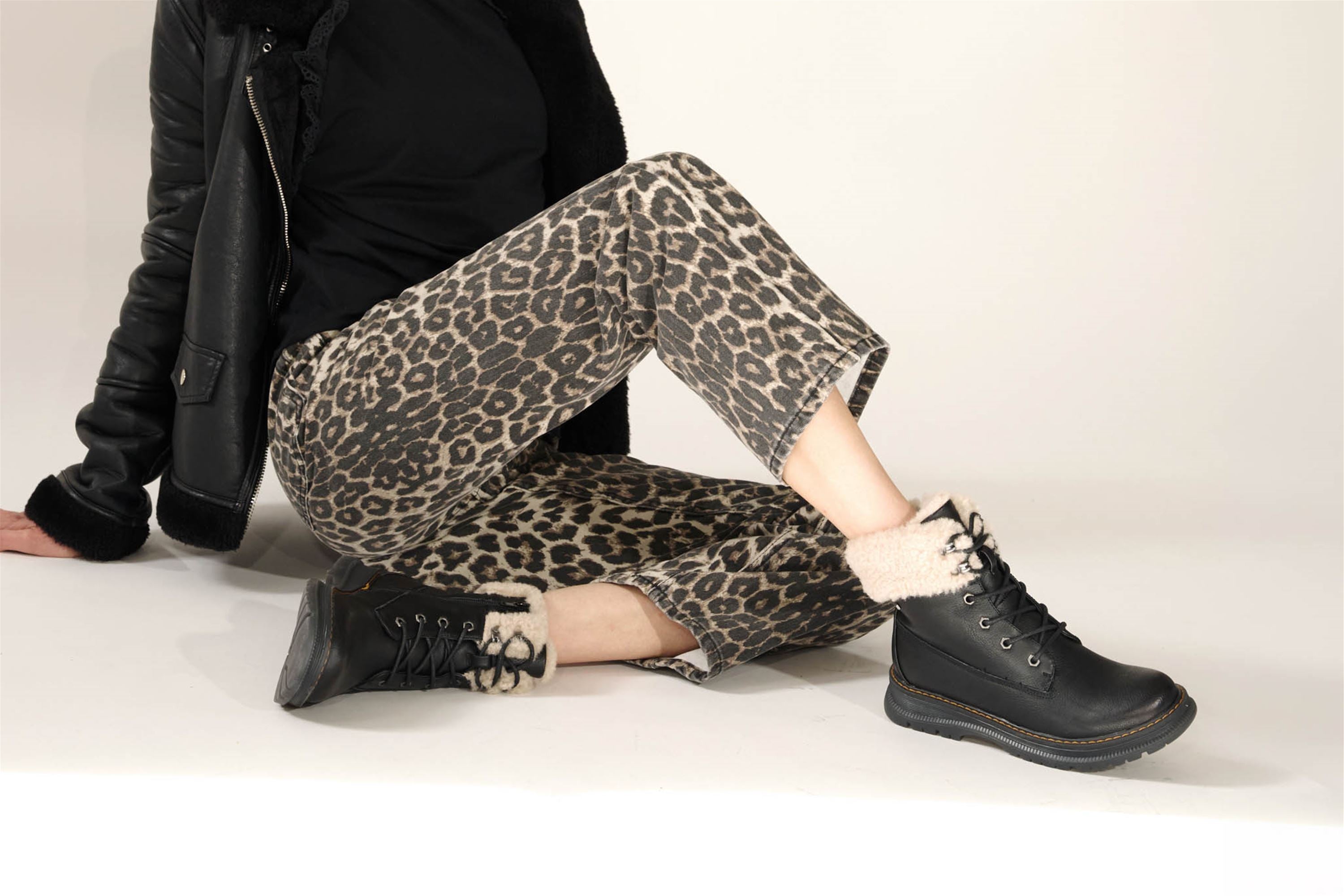 Westland Peyton 16 women's black vegan waterproof zip-and-lace faux fur ankle boots worn on foot, Westland lifestyle view 3.