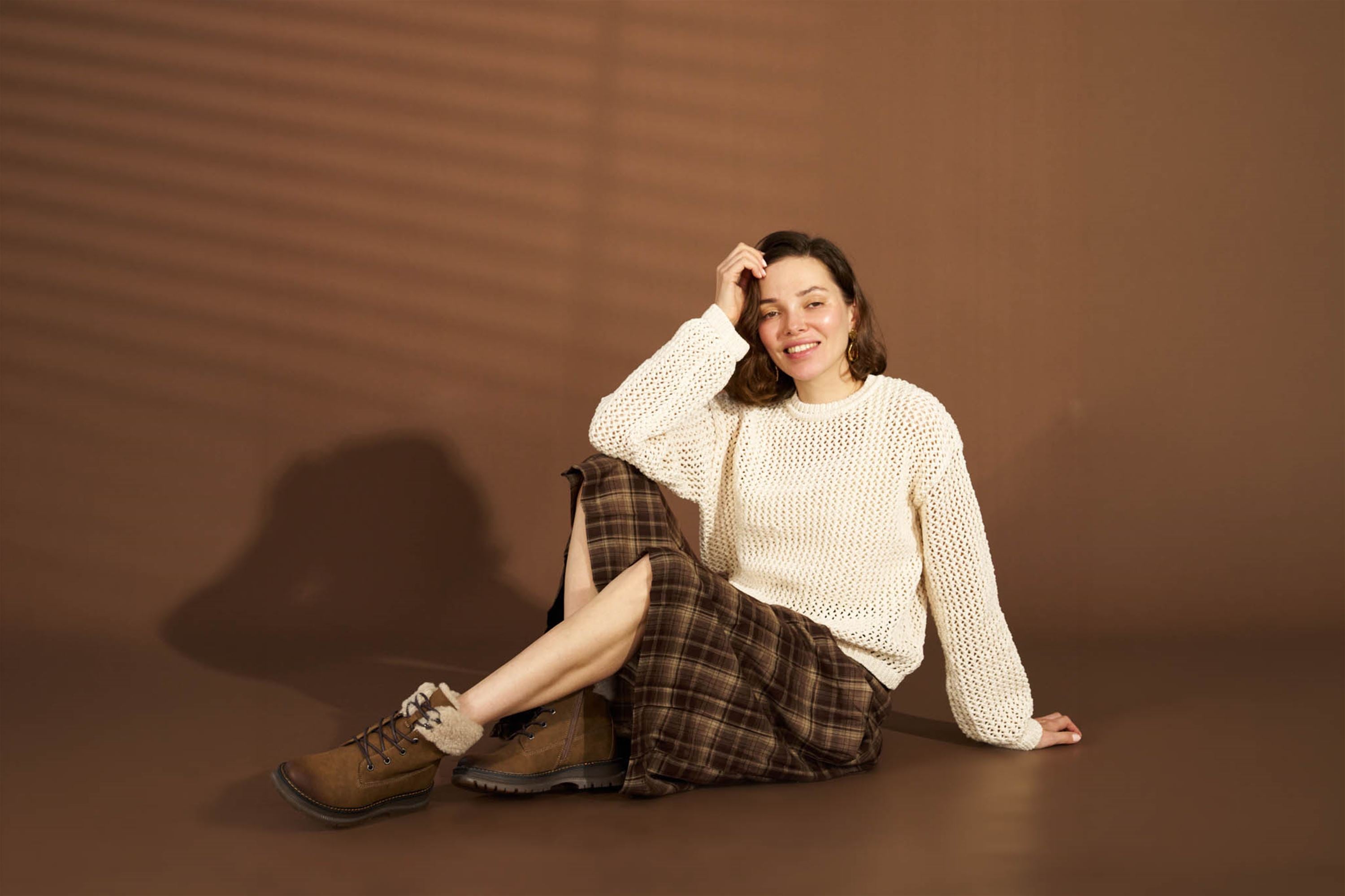 Westland Peyton 16 women's brown vegan waterproof zip-and-lace faux fur ankle boots worn on foot, Westland lifestyle view 2.